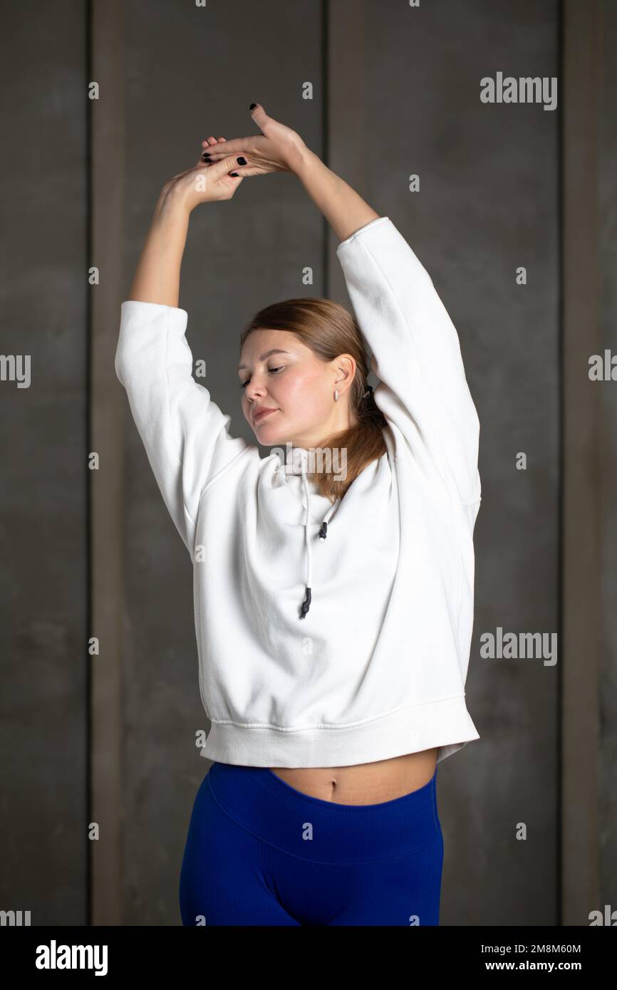 Fit blonde stretching back on hi-res stock photography and images - Alamy