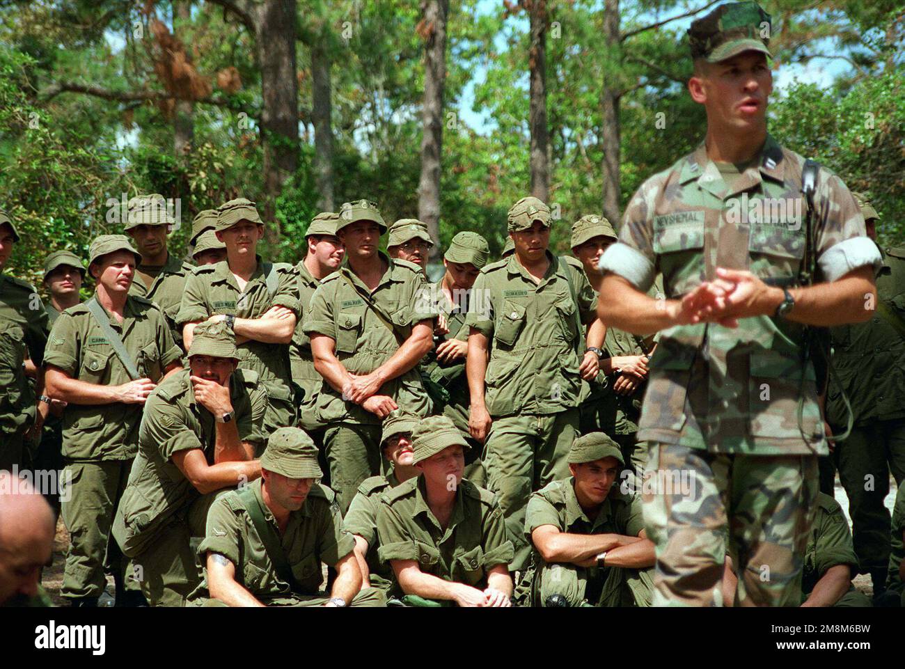 Canadian troops listen on as CAPT. Nevshemal, 2nd Battalion, 6th ...