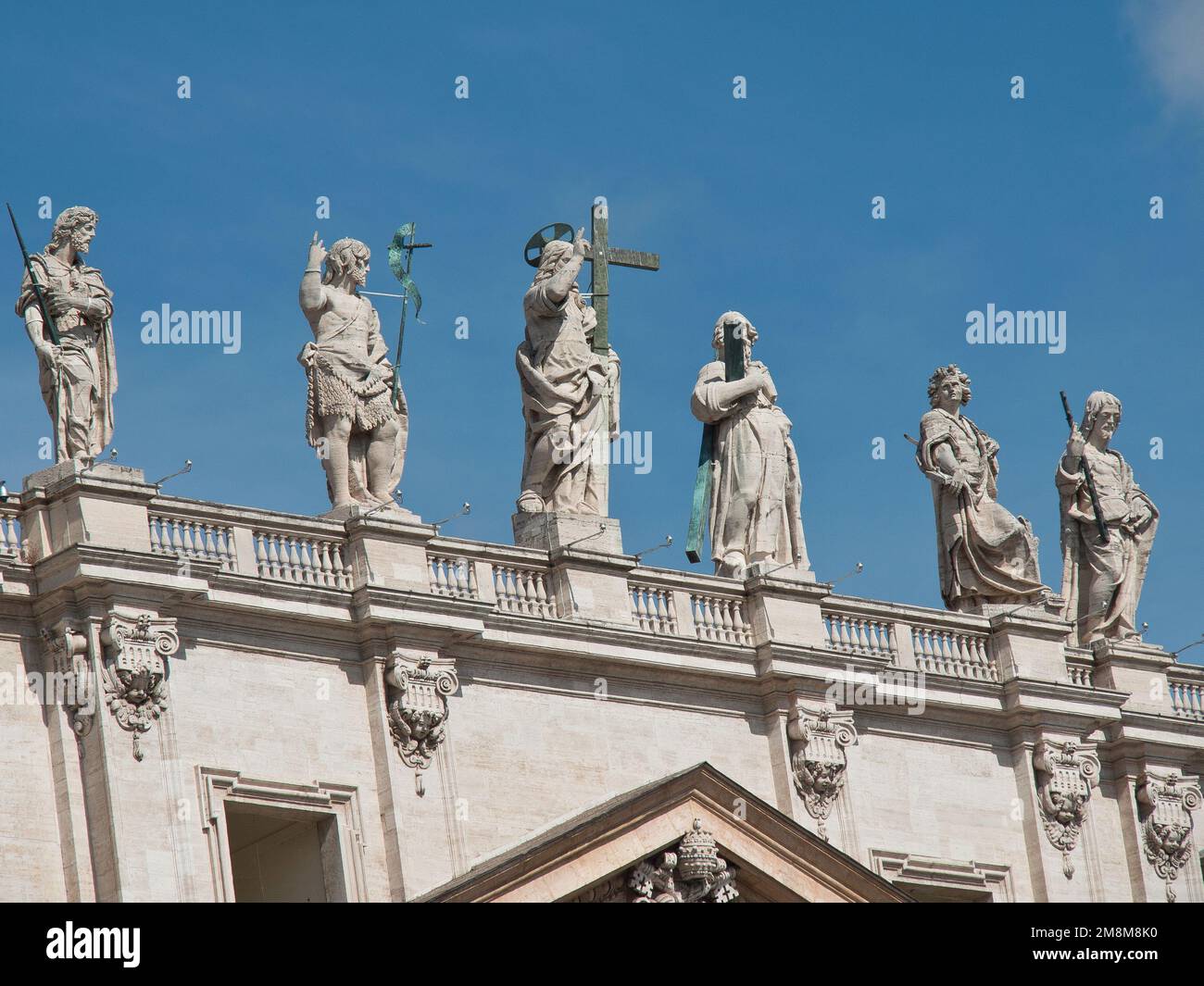 The statues on the top of St. Peter's Basilica in Vatican City of Rome