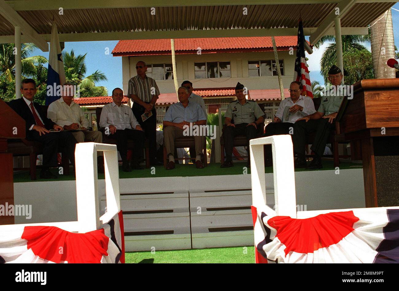 Seated from left to right are the speakers during the Fort Amador Transfer Ceremony: Mr. Alberto Aleman Zubieta, PCC Administrator; Mr. Ricardo Alberto Arias, Chancellor of Panama; Mr. Ernesto Perez Balladares, President of Panama; GEN. Wesley K. Clark, Commander in CHIEF US Southern Command; Dr. Nicolas Ardito Barlette, ARI General Administrator; and MAJ. GEN. Lawson W. Magruder III, Commanding General, US Army South. Base: Fort Amador Country: Panama (PAN) Stock Photo