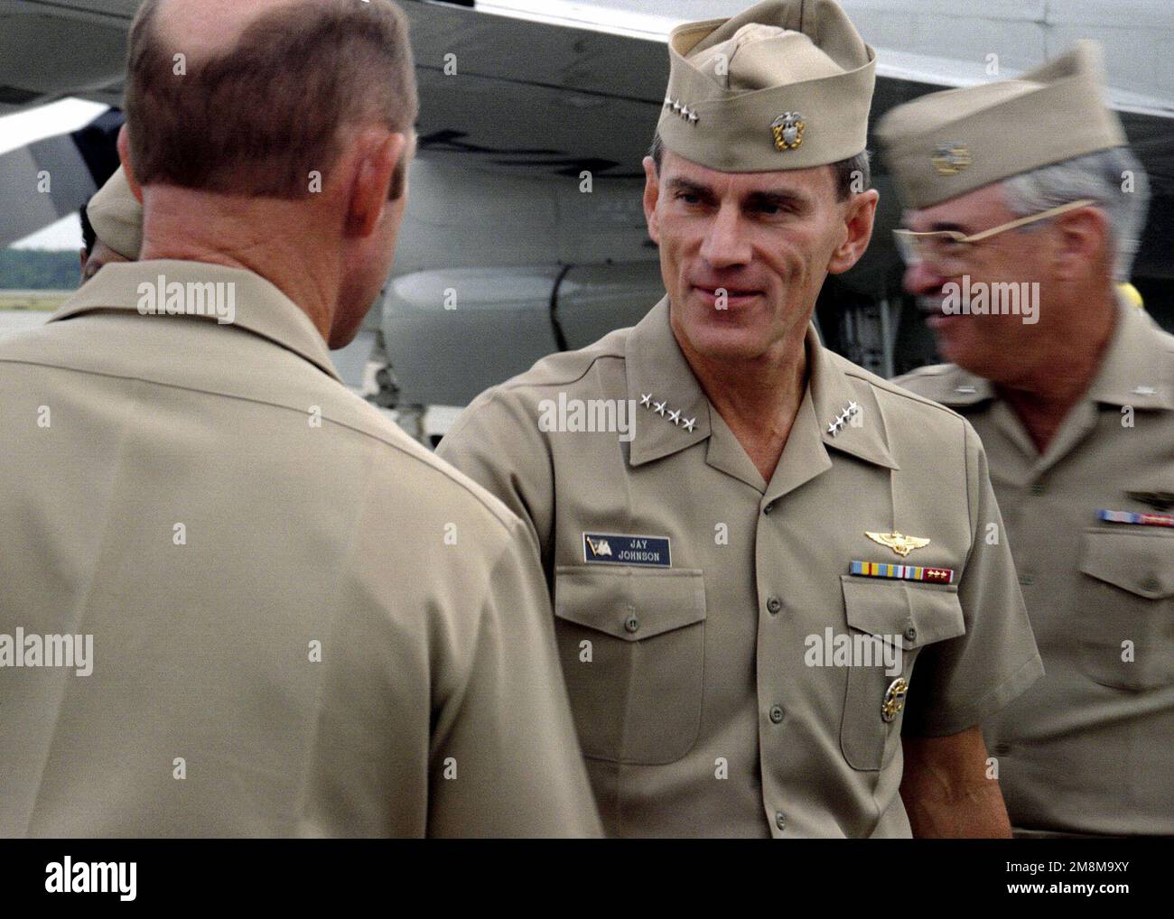 MASTER CHIEF (MCPO) Higenbotham greets US NAVY Admiral (ADM) Jay