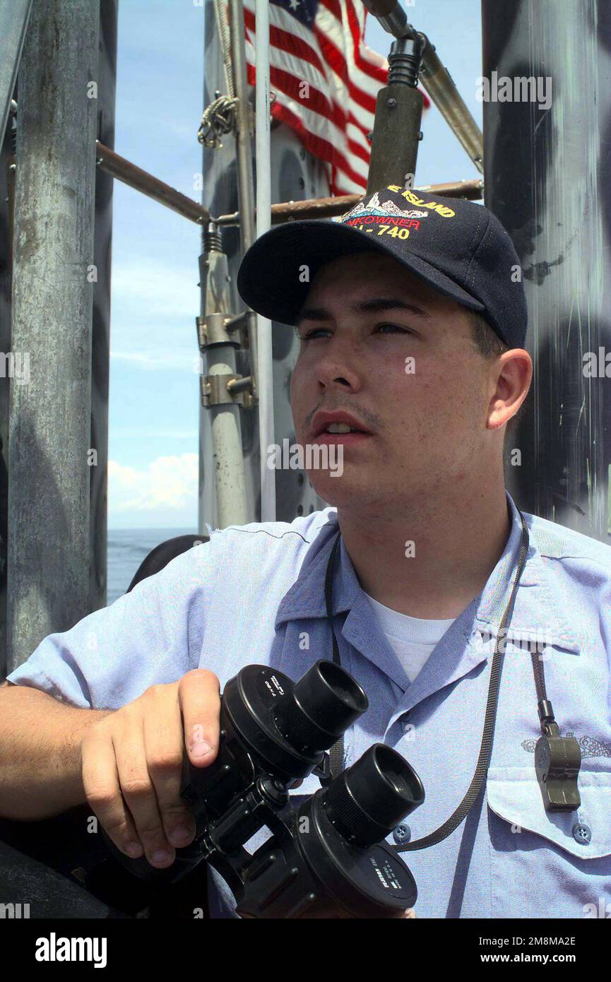 us-navy-torpedoman-s-mate-2nd-class-kurt-stiener-stands-watch-on-board