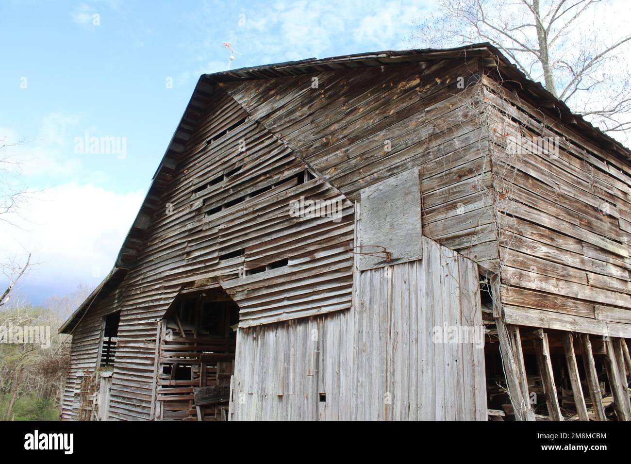 Weathered old barn wall with basketball hoop Stock Photo Alamy