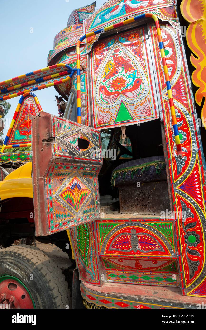 Detail of a colorfully painted truck at the workshop, Peshawar, Pakistan Stock Photo