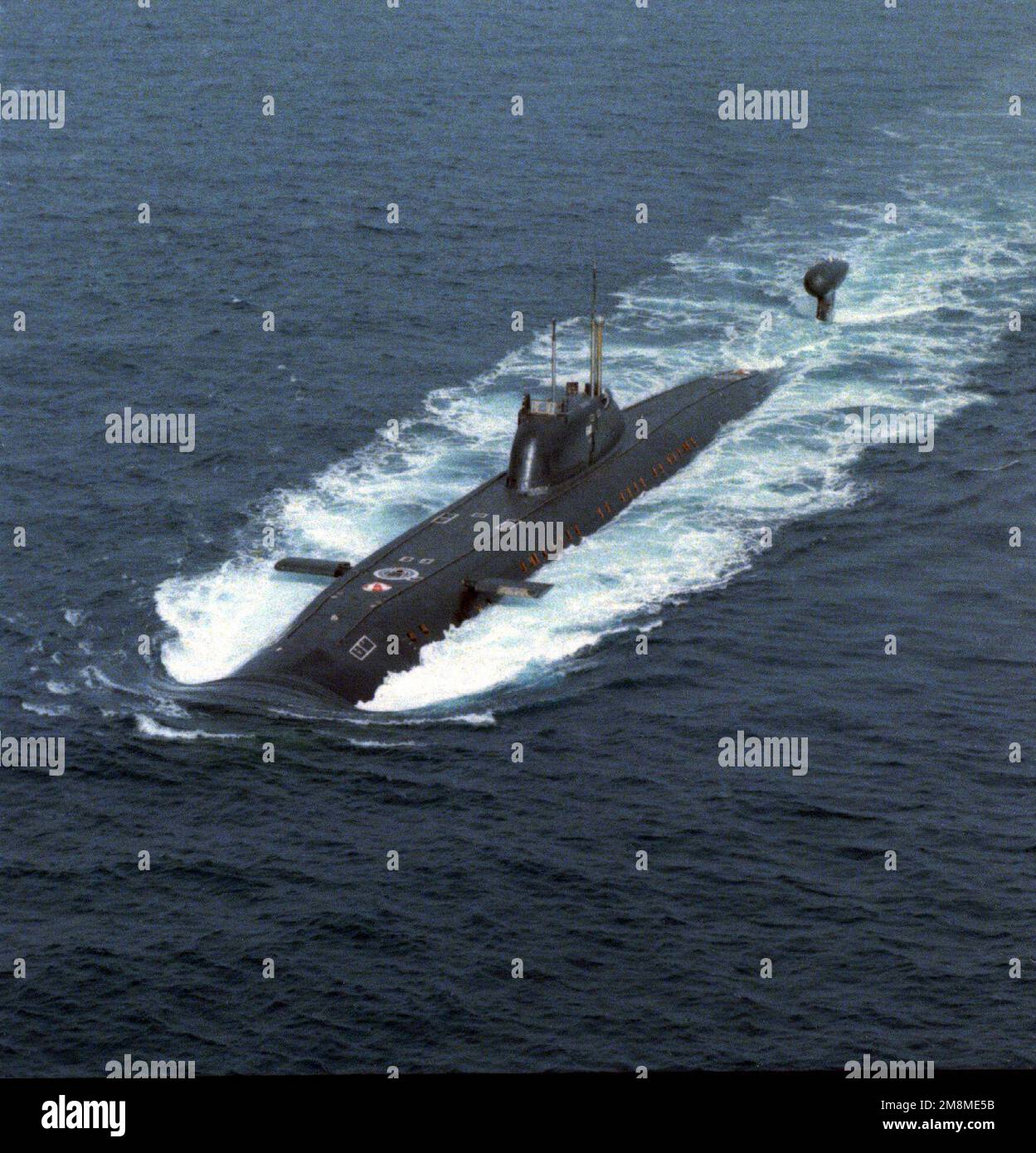 Aerial port bow view of a Russian Northern Fleet Victor III class nuclear-powered attack submarine underway on the surface. Country: Baltic Sea Stock Photo