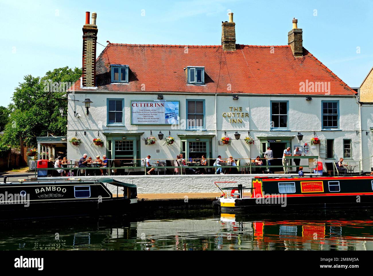 Ely, The Cutter Inn, barges, River Ouse, Cambridgeshire, England, UK Stock Photo
