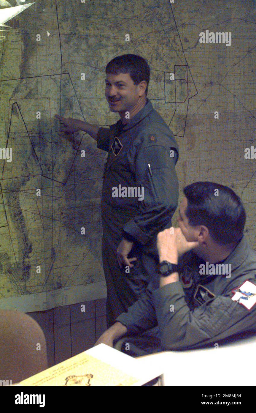 During a preflight briefing, MAJ John Heard, an F16 pilot, 188th