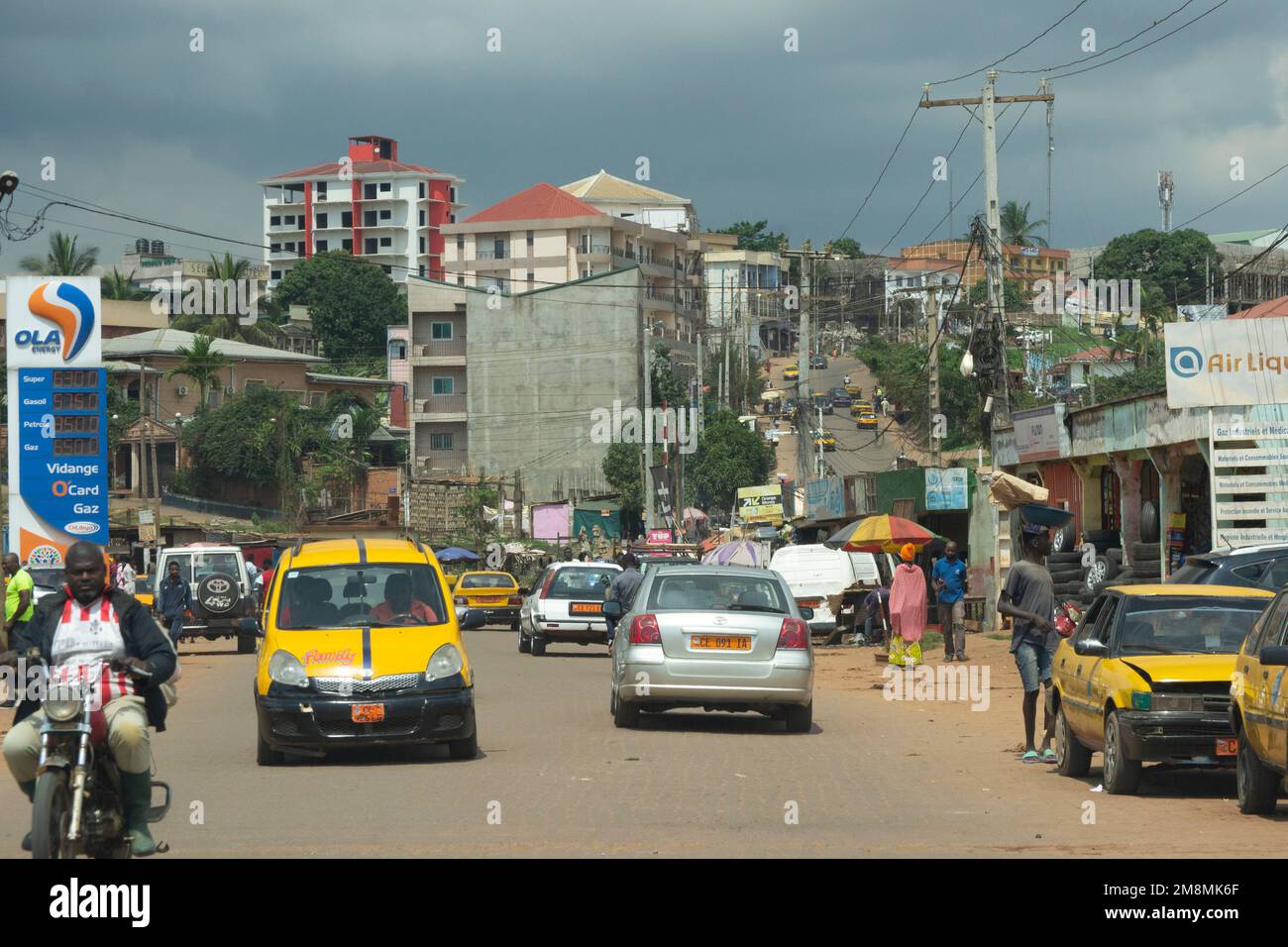 Scene of life in the streets of Yaounde in Cameroon, ngousso district locality ngousso rails Stock Photo
