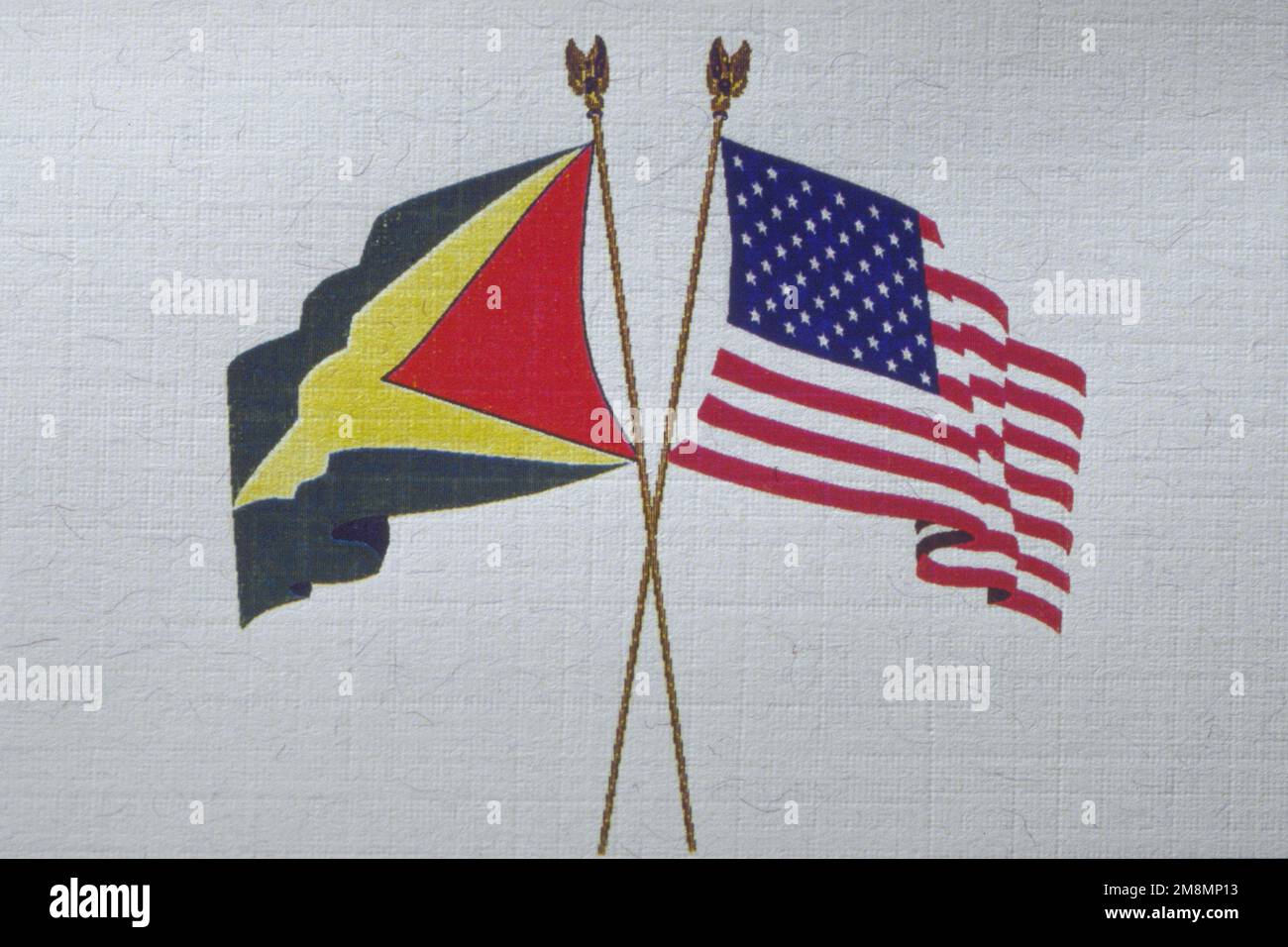 An emblem of the American Flag and Guyanese Flag crossed at staffs that ...