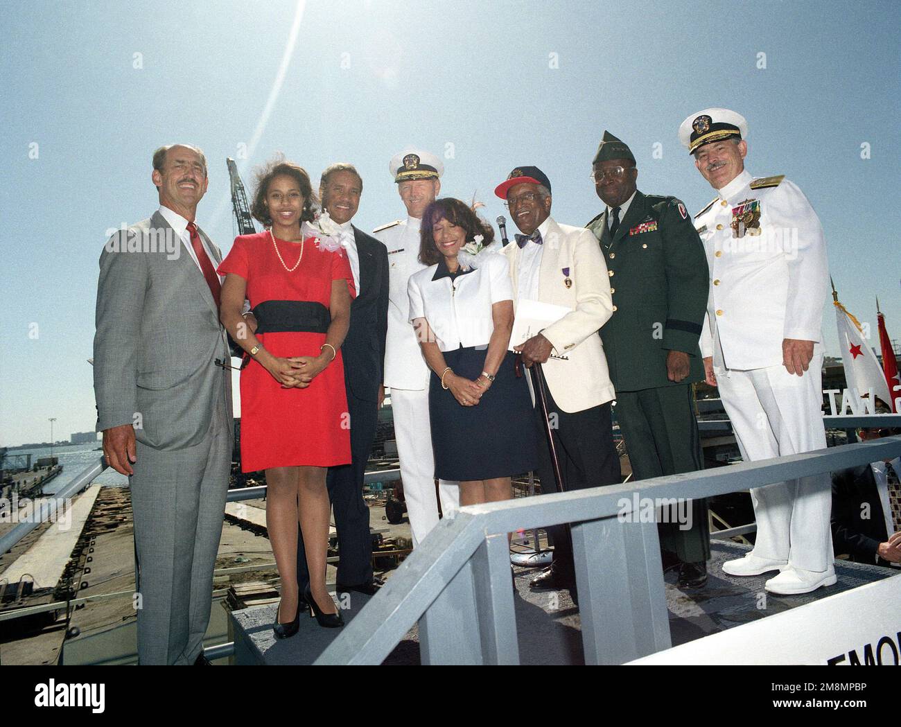 View of the official christening and launch party for the Military Sealift Command (MCS) Bob Hope class vehicle transport ship USNS WATSON (T-AKR-310). (Left to right): Richard A. Vortmann, NASSCO President; Ms. Hilary West, Maid of Honor; Secretary of the Army Togo D. West Jr.; Rear Admiral William H. Butler, USNR, Deputy Commander NavSurFor Pacific; Mrs. Gail Berry West, Sponsor; Mr. J. Gilford, honored guest; General Johnny Wilson, USA, Commanding General, Army Material Command; and Rear Admiral David P. Sargent Jr. USN, NavSeaSysCom (R&D). Base: San Diego State: California (CA) Country: Un Stock Photo