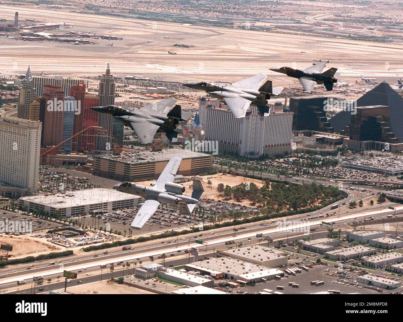 An A10, F15E, F15C and a F16D from Nellis AFB, fly a finger tip