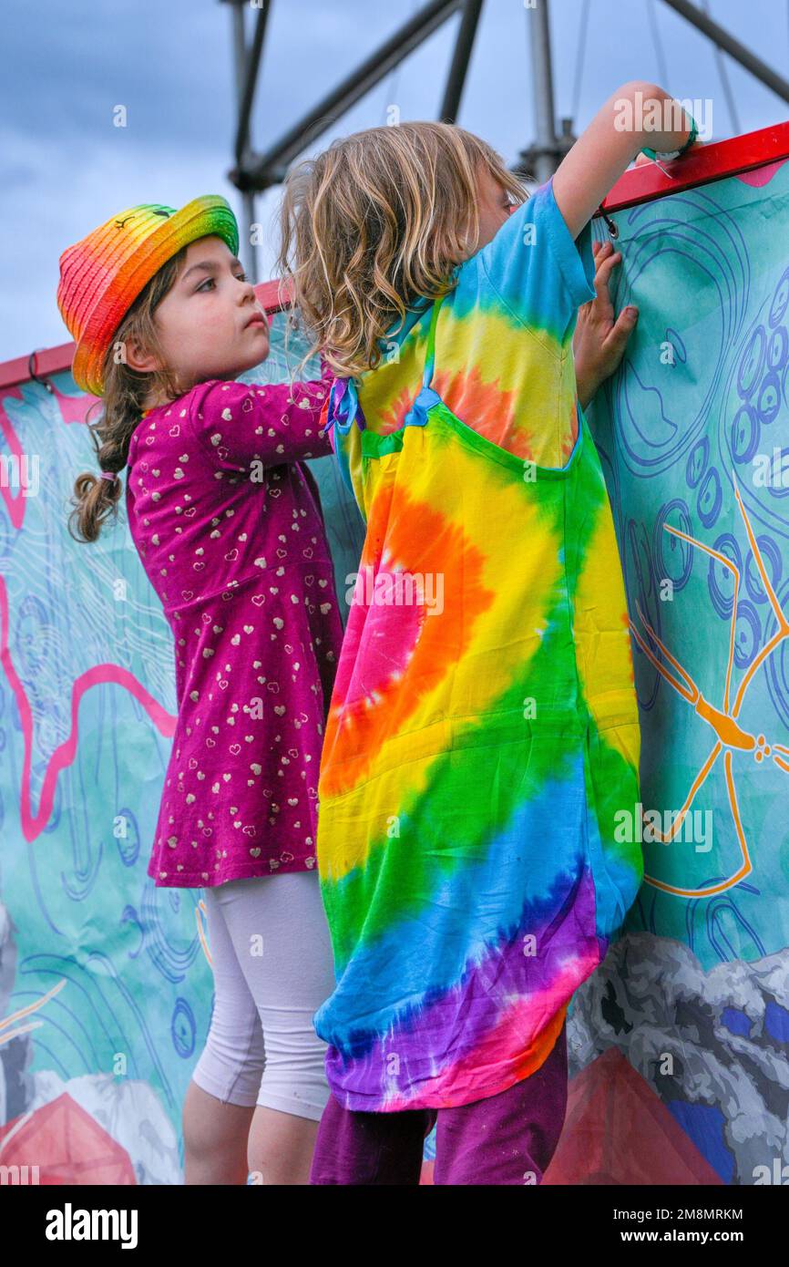 kids in tie dye clothes, at a music festival Stock Photo