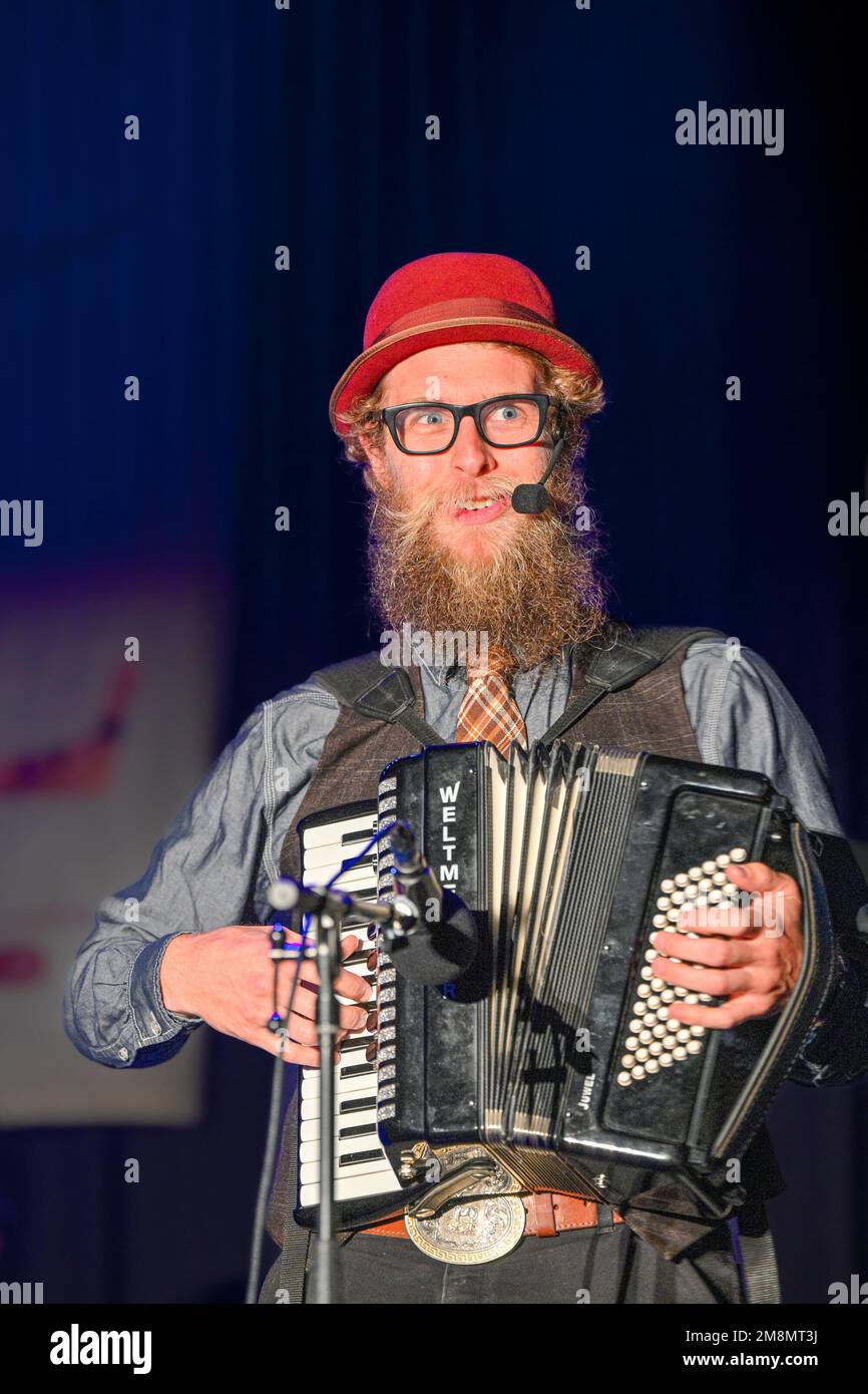 Strangely Doesburg, accordion player,  independent cabaret musician, Mission Folk Music Festival, Mission, British Columbia, Canada Stock Photo