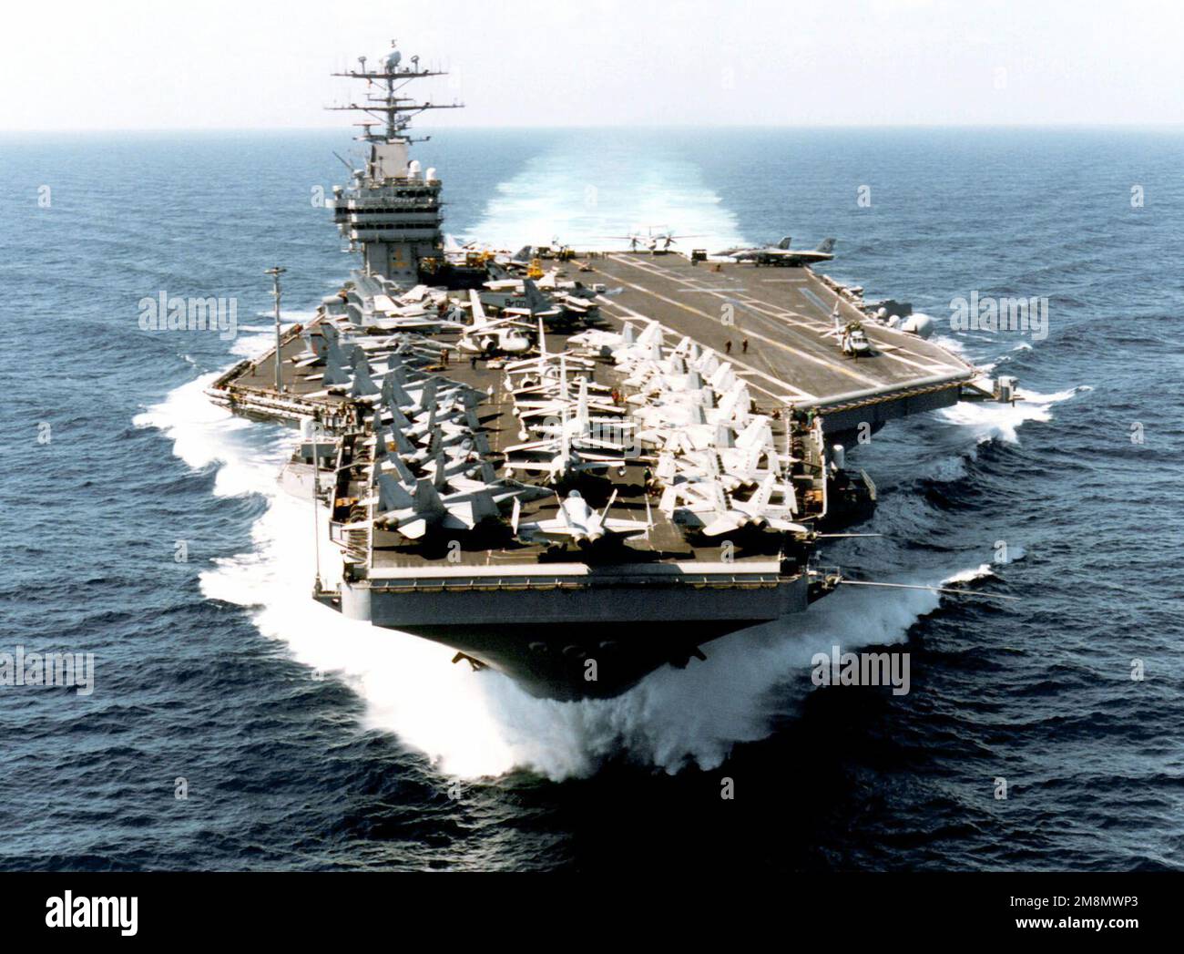 The nuclear powered aircraft carrier USS GEORGE WASHINGTON (CVN 73) underway in the Arabian Sea during their tranist to the Persian Gulf. George Washington will enforce UN sanctions against Iraq by patrolling the No-Fly Zone under Operation Southern Watch. Subject Operation/Series: SOUTHERN WATCH Country: Unknown Stock Photo