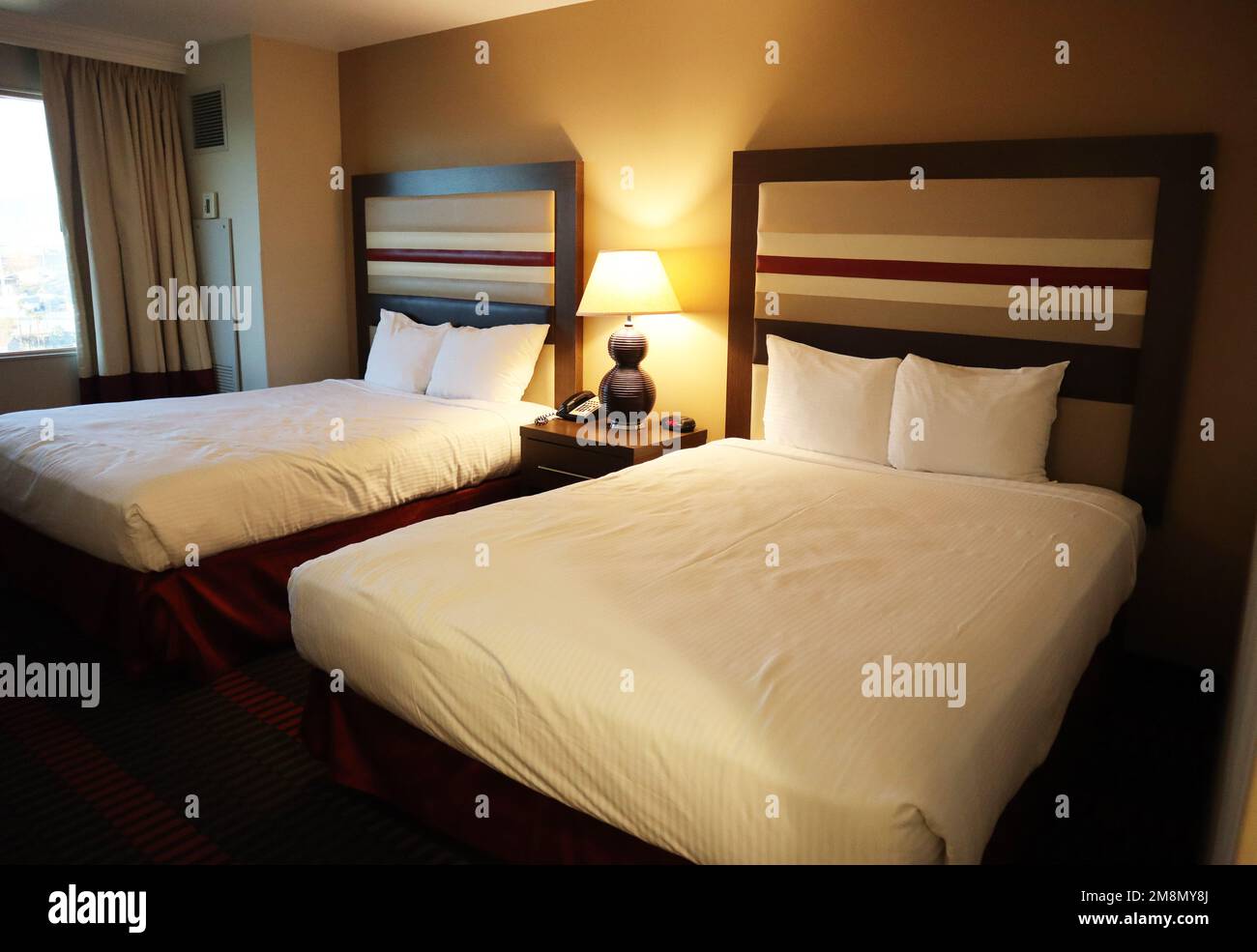 Luxurious hotel room with two beds hotel room at tourist resort Stock