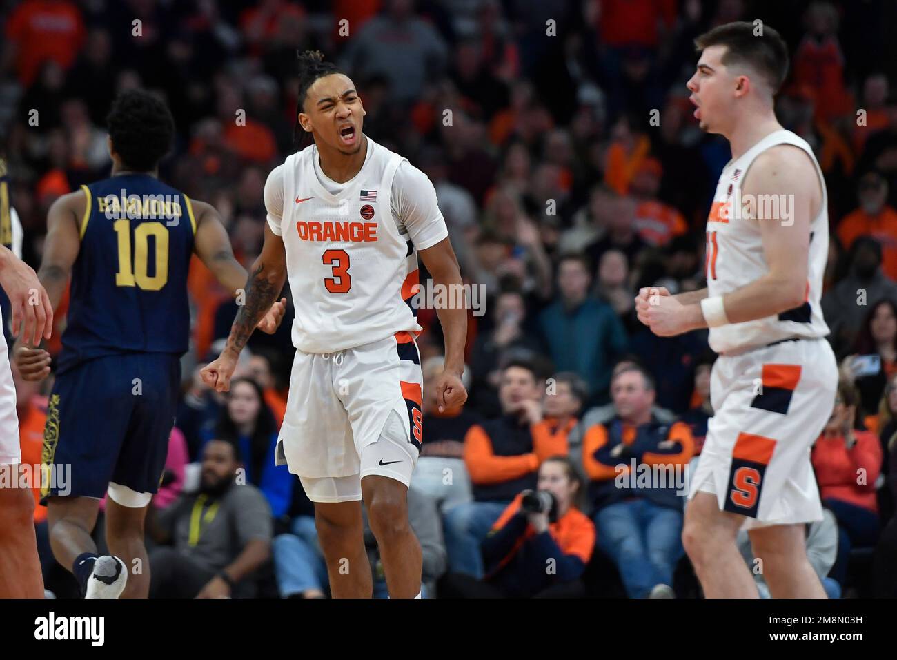 Syracuse guard Judah Mintz (3) celebrates with guard Joseph Girard III