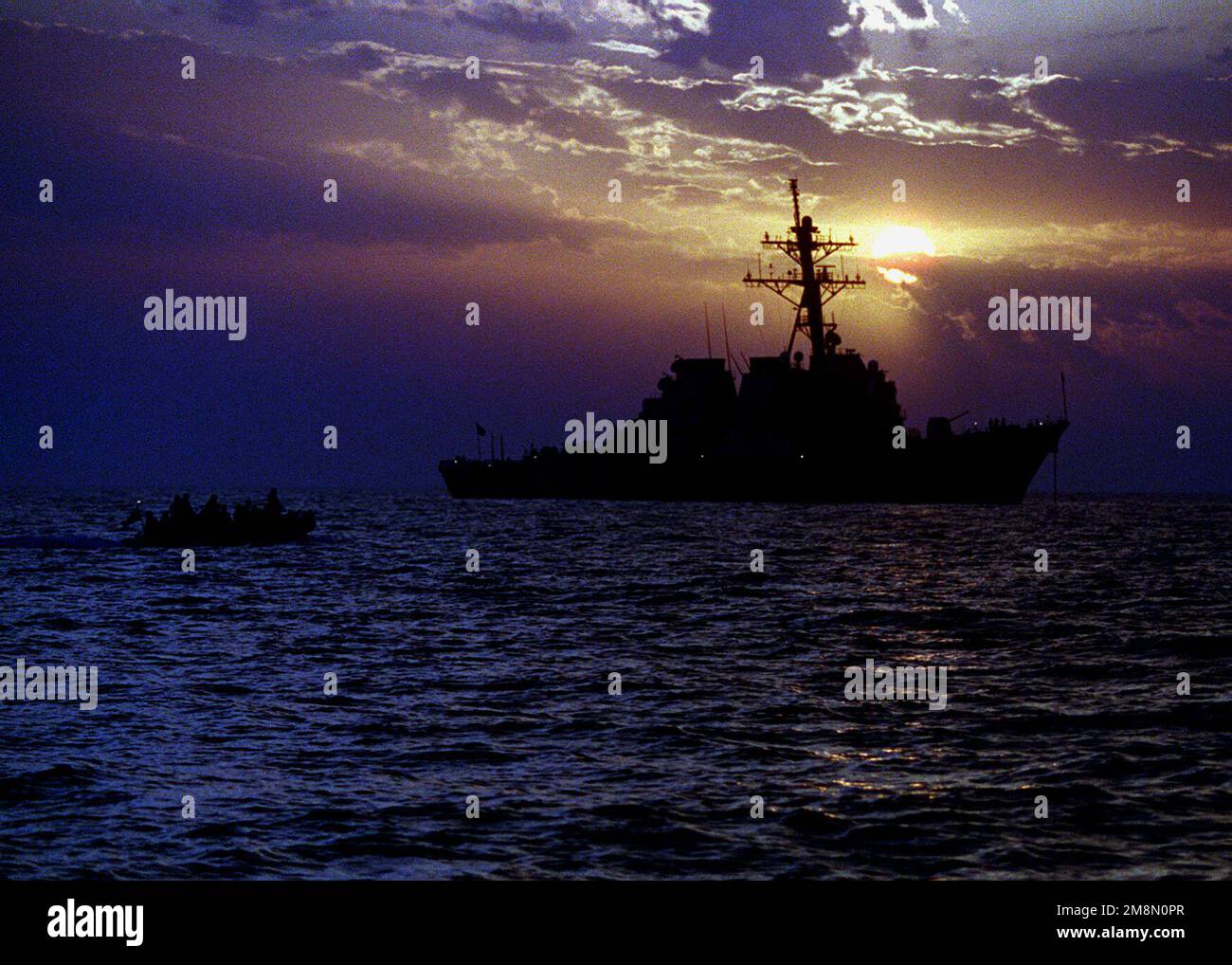 A rib boat returns to the USS CARNEY (DDG 64) while the ship conducts ...