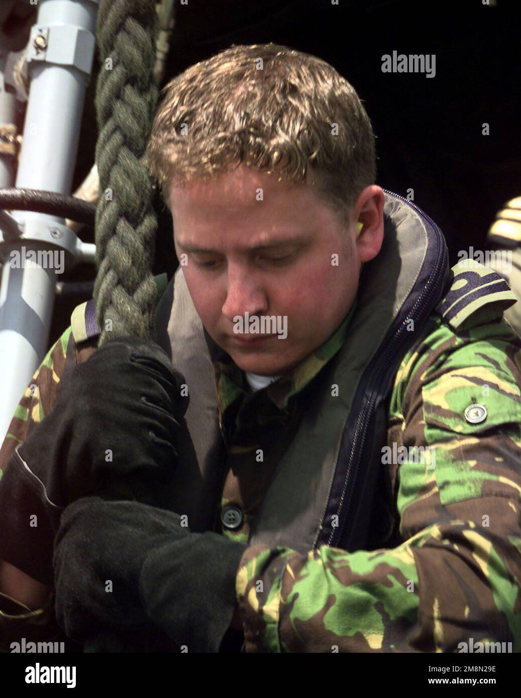 British Royal Navy Lieutenant Adrian Bratt, Boarding Officer for the