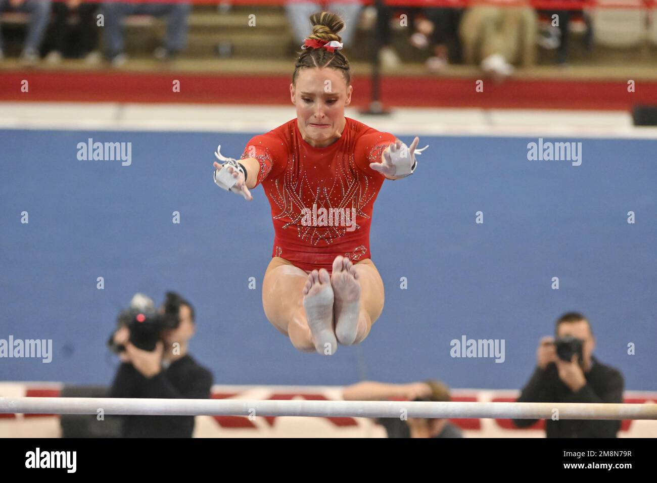 Arkansas gymnast Kennedy Hambrick competes on the bars against Alabama
