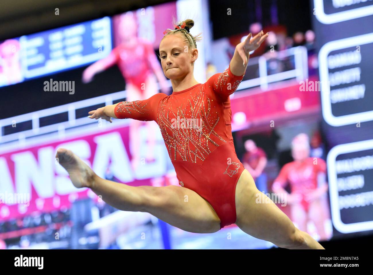 Arkansas gymnast Bailey Lovett competes on the beam against Alabama