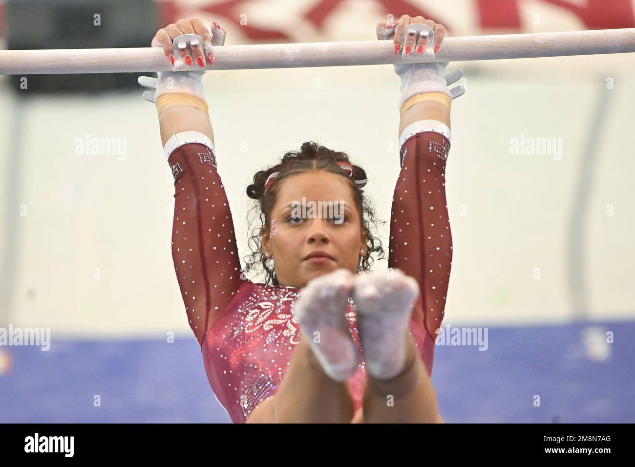 Alabama gymnast Makarri Doggette competes on the bars against Arkansas ...