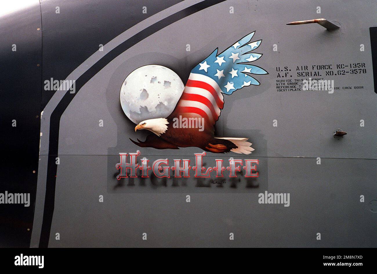 Suffolk County, England. 'High Life' nose art on a KC-135R Stratotanker aircraft, serial number 62-3578, assigned to the 100th Air Refueling Wing, Royal Air Force (RAF) Mildenhall. The artist is STAFF Sergeant Charles Hatton, assigned to the 100th Aircraft Generation Squadron. Base: Raf Mildenhall Country: Great Britain / England (GBR) Stock Photo