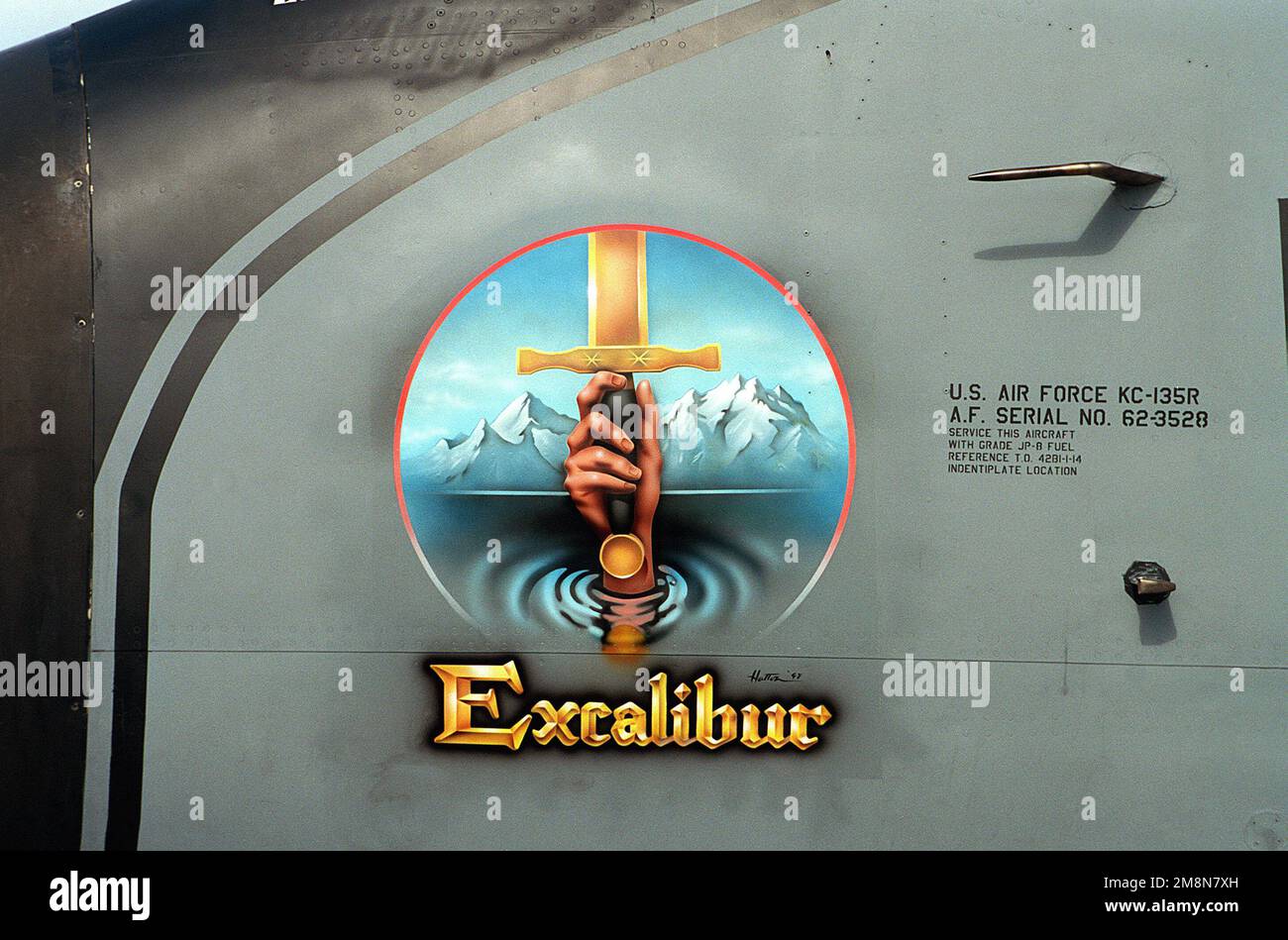 Suffolk County, England. 'Excalibur' nose art on a KC-135R Stratotanker aircraft, serial number 62-3528, assigned to the 100th Air Refueling Wing, Royal Air Force (RAF) Mildenhall. The artist is STAFF Sergeant Charles Hatton, assigned to the 100th Aircraft Generation Squadron. Base: Raf Mildenhall Country: Great Britain / England (GBR) Stock Photo
