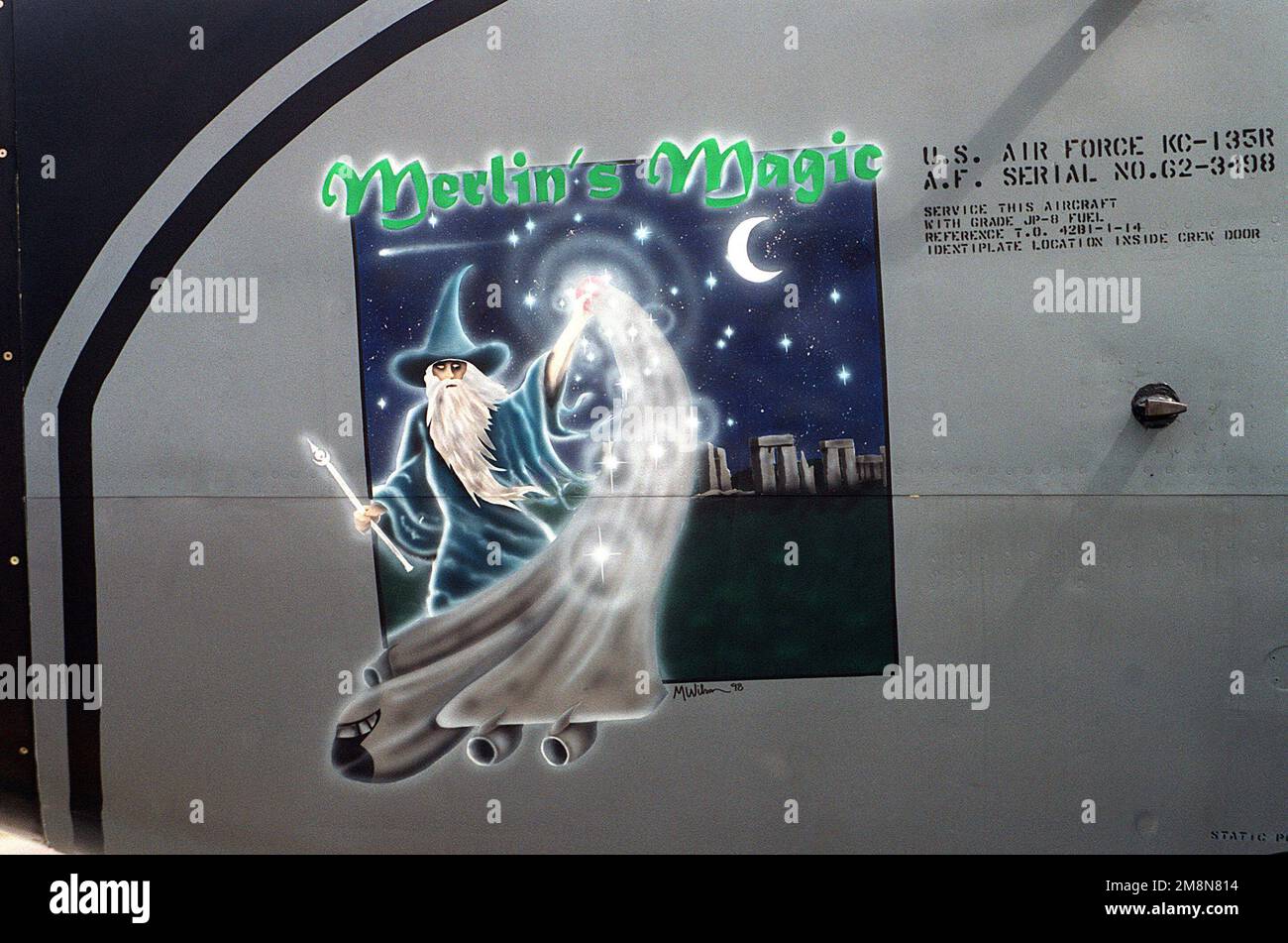 Suffolk County, England. 'Merlin's Magic' nose art on a KC-135R Stratotanker aircraft, serial number 62-3498, assigned to the 100th Air Refueling Wing, Royal Air Force (RAF) Mildenhall. The artist is STAFF Sergeant Charles Hatton, assigned to the 100th Aircraft Generation Squadron. Base: Raf Mildenhall Country: Great Britain / England (GBR) Stock Photo
