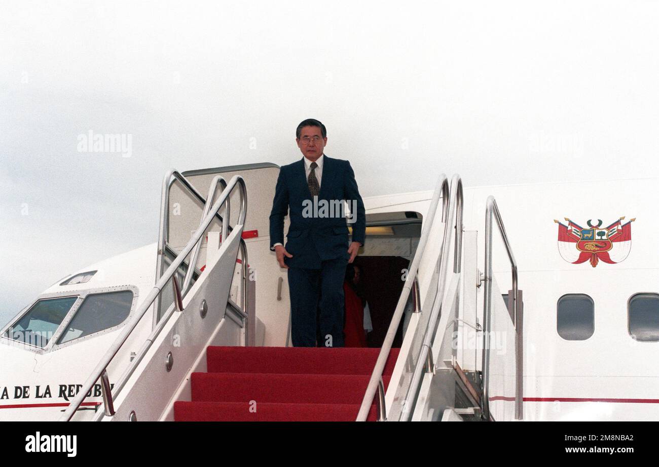 Mr. Alberto Fujimori, President of Peru, emerges from his aircraft moments after arriving at Andrews Air Force Base, Maryland. Base: Andrews Air Force Base State: Maryland (MD) Country: United States Of America (USA) Stock Photo