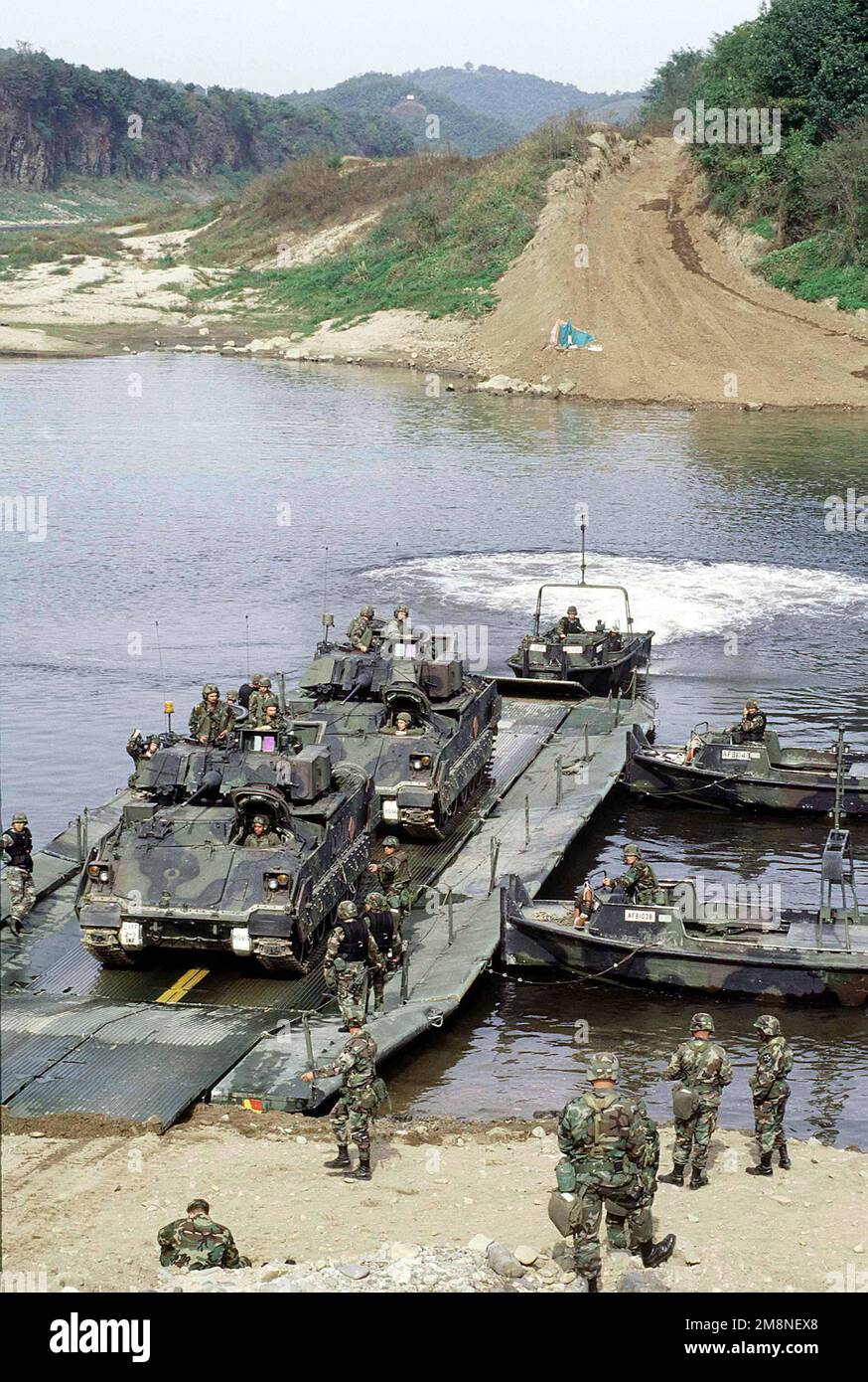 Two M2 Bradley Fighting Vehicles Assigned To The 2 9 Infantry Camp two-m2-bradley-fighting-vehicles-assigned-to-the-2-9-infantry-camp
