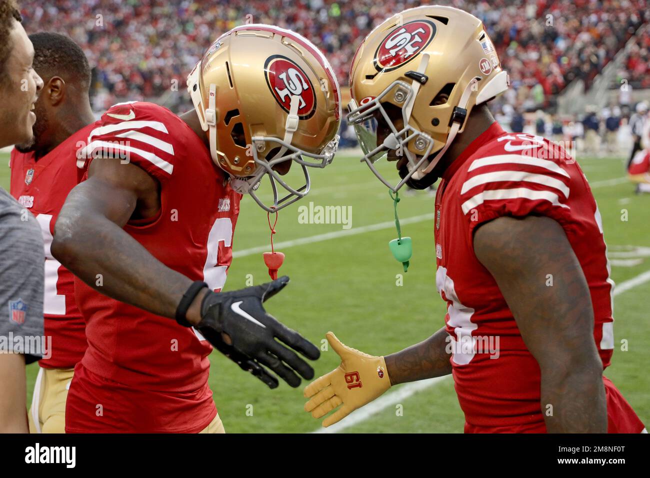 San Francisco 49ers wide receiver Danny Gray (6) congratulates wide  receiver Deebo Samuel (19) after a TD during an NFL wild card playoff  football game against the Seattle Seahawks on, Saturday, Jan.14