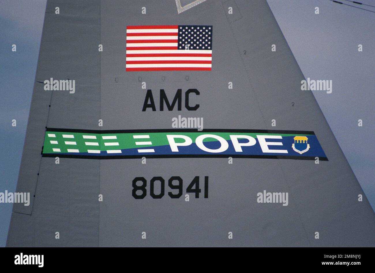 The new tail marking of the 43rd Airlift Wing diagonally splits the ...