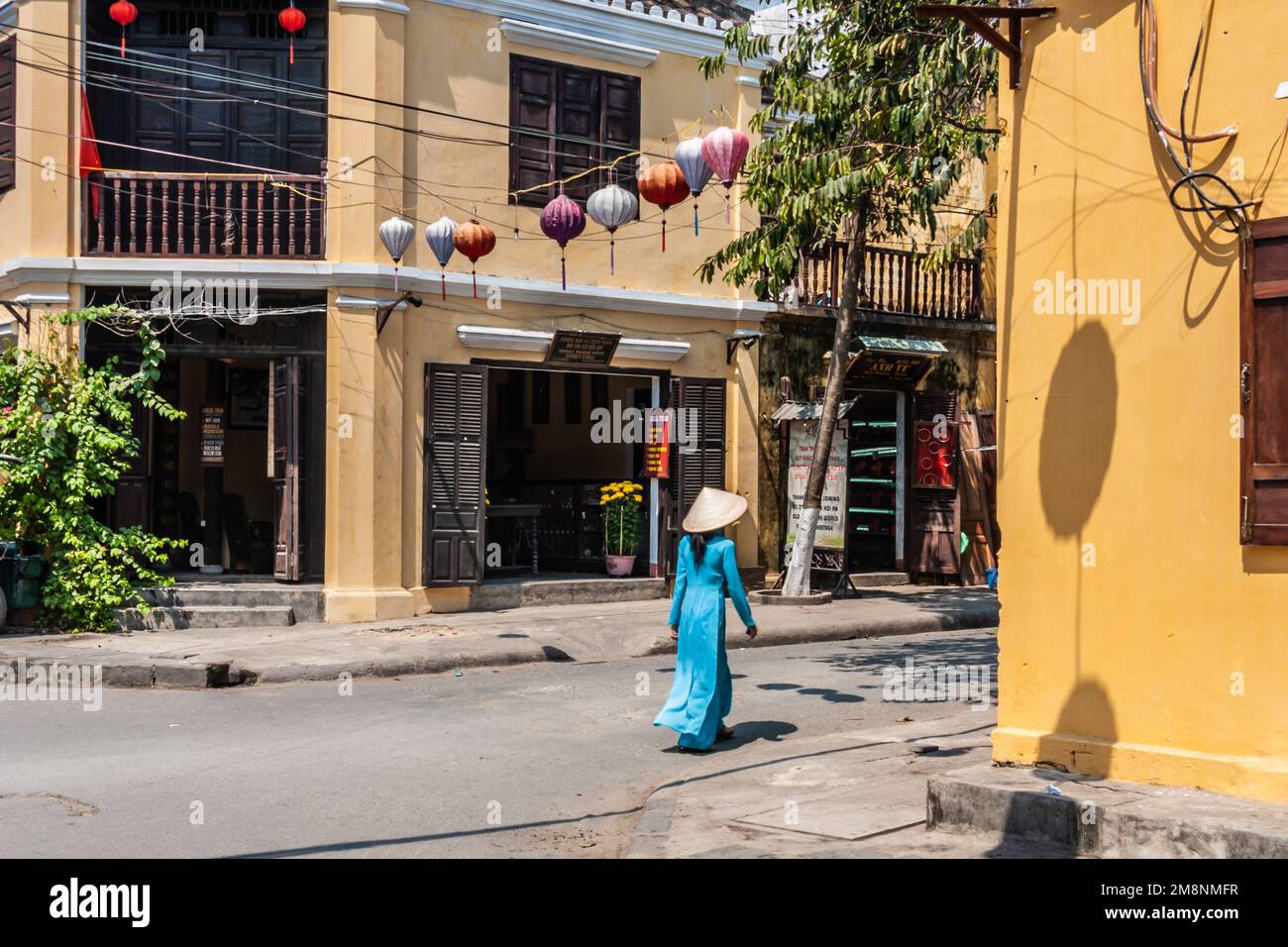 The girl in the blue dress, Hoi An, Vietnam Stock Photo