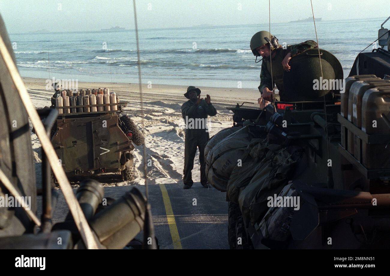 990423-M-2889C-012. [Complete] Scene Caption: A member of the LCAC ...