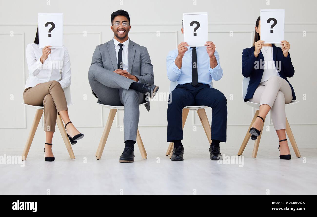 Portrait of indian businessman as selected candidate in group of diverse businesspeople waiting for interview. Team of men and women applicants in Stock Photo