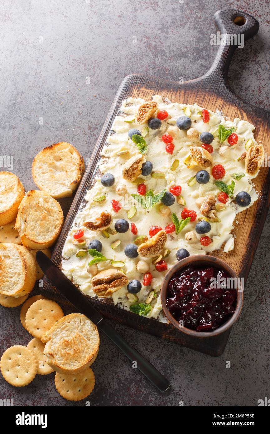 Butter board food trend, butter spread on wooden board with sweet