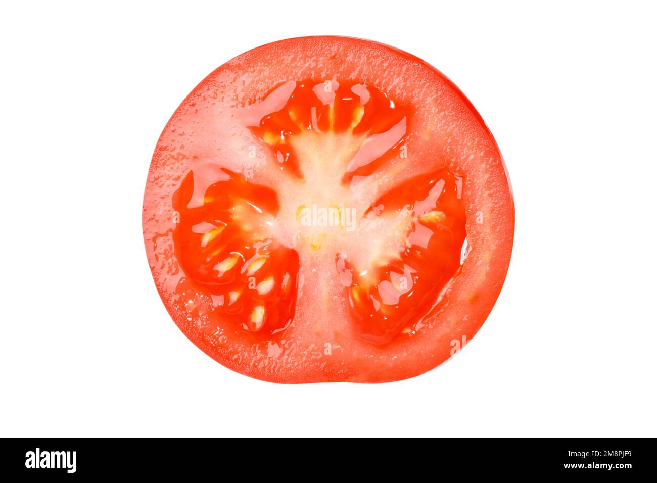 Tomato cut in half. Fresh, juicy. Tomato. View from above. Isolated. Stock Photo