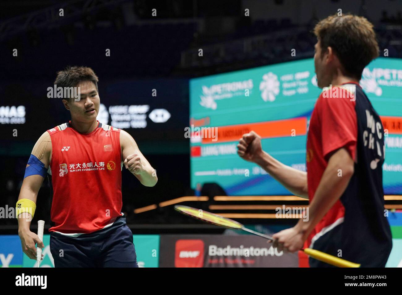 China's Liang Wei Keng, left, and Wang Chang react during their men's ...