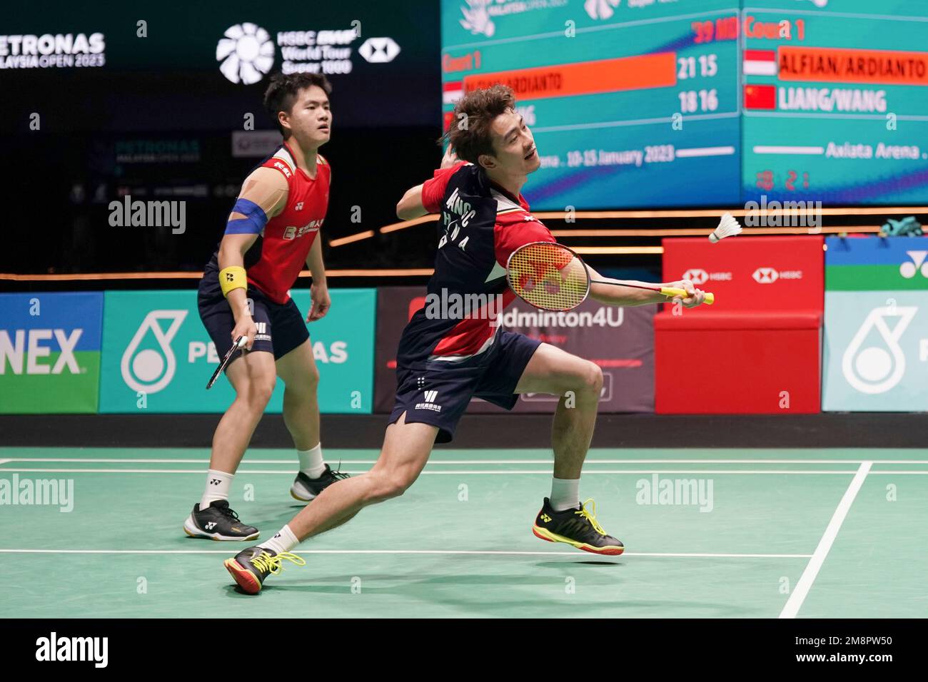 China's Wang Chang, right, and Liang Wei Keng play a shot against ...