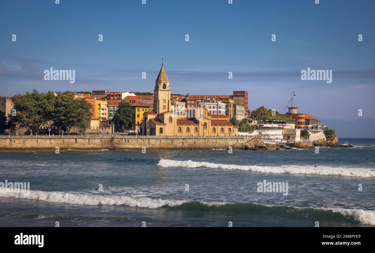 Seascape with Morning Light at San Lorenzo Beach in Gijon, Spain Stock Photo
