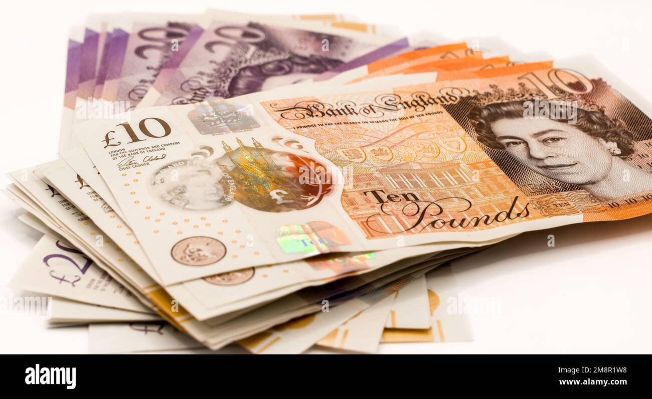 close-up of a pile of ten and twenty pound sterling notes Stock Photo