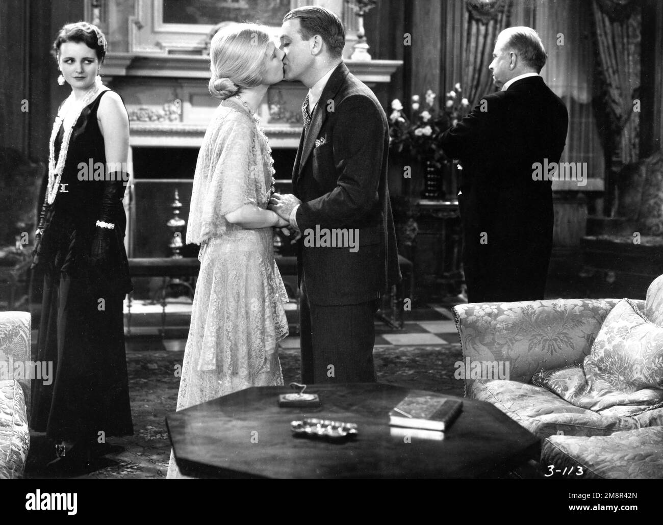 MARY ASTOR ANN HARDING ROBERT AMES and WILLIAM HOLDEN in HOLIDAY 1930 director EDWARD H. GRIFFITH play Philip Barry photoplay by Horace Jackson costumer Gwen Wakeling Pathe Exchange Stock Photo