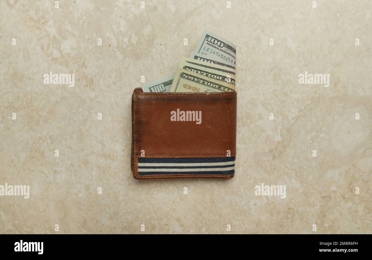 Wallet with dollar banknotes. Home budget planning. Concept of costs of living and inflation financial crisis. Stock Photo