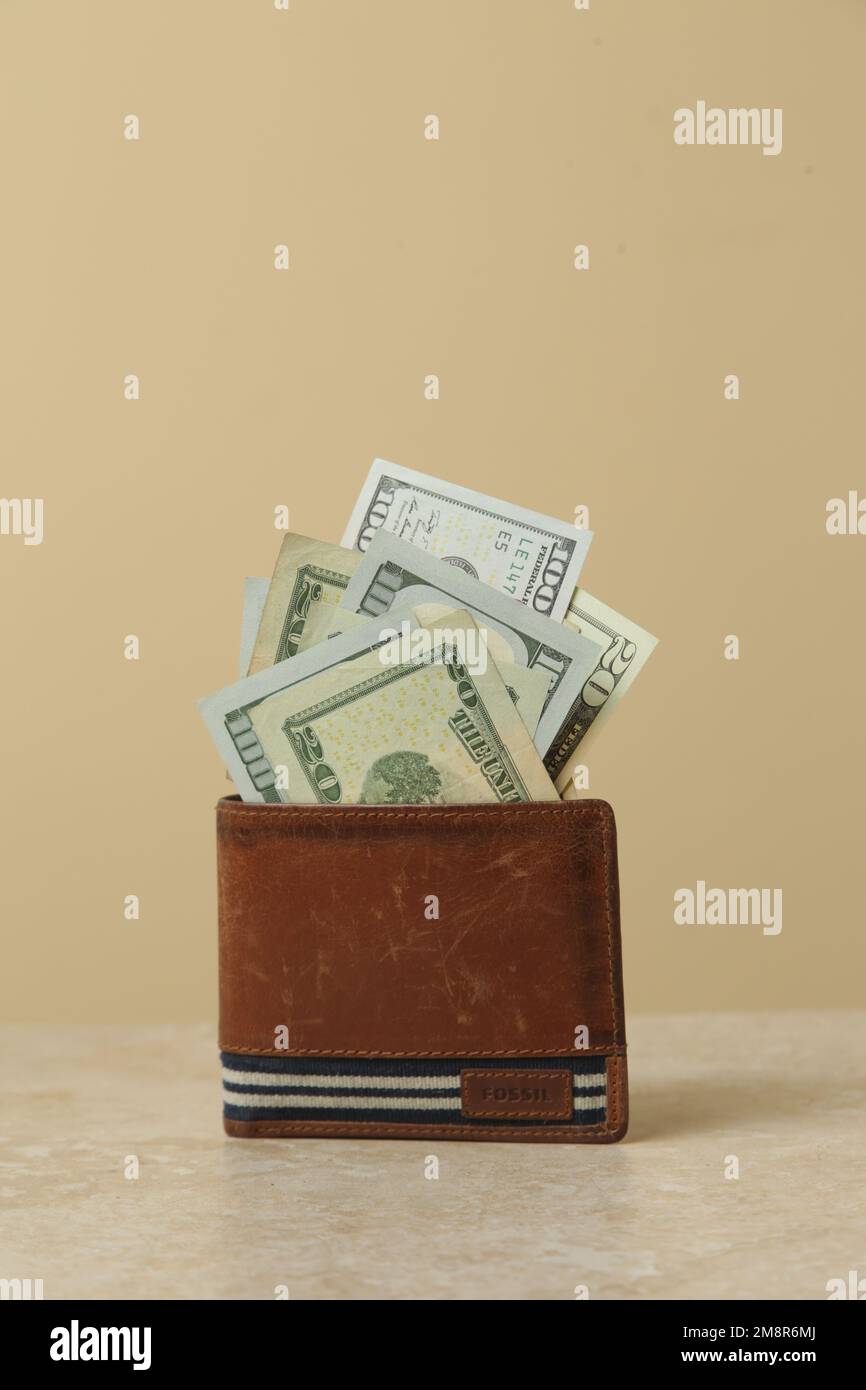 Wallet with dollar banknotes. Home budget planning. Concept of costs of living and inflation financial crisis. Stock Photo