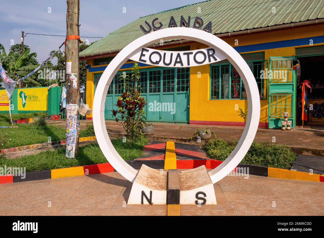Equator sign and installation in the Ugandan town of Kayabwe, on the Kampala - Masaka highway.  Popular photo opportunity for tourists and travellers. Stock Photo