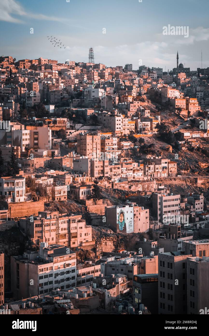 Sunset in downtown Amman, capturing the golden hour sunlight from the