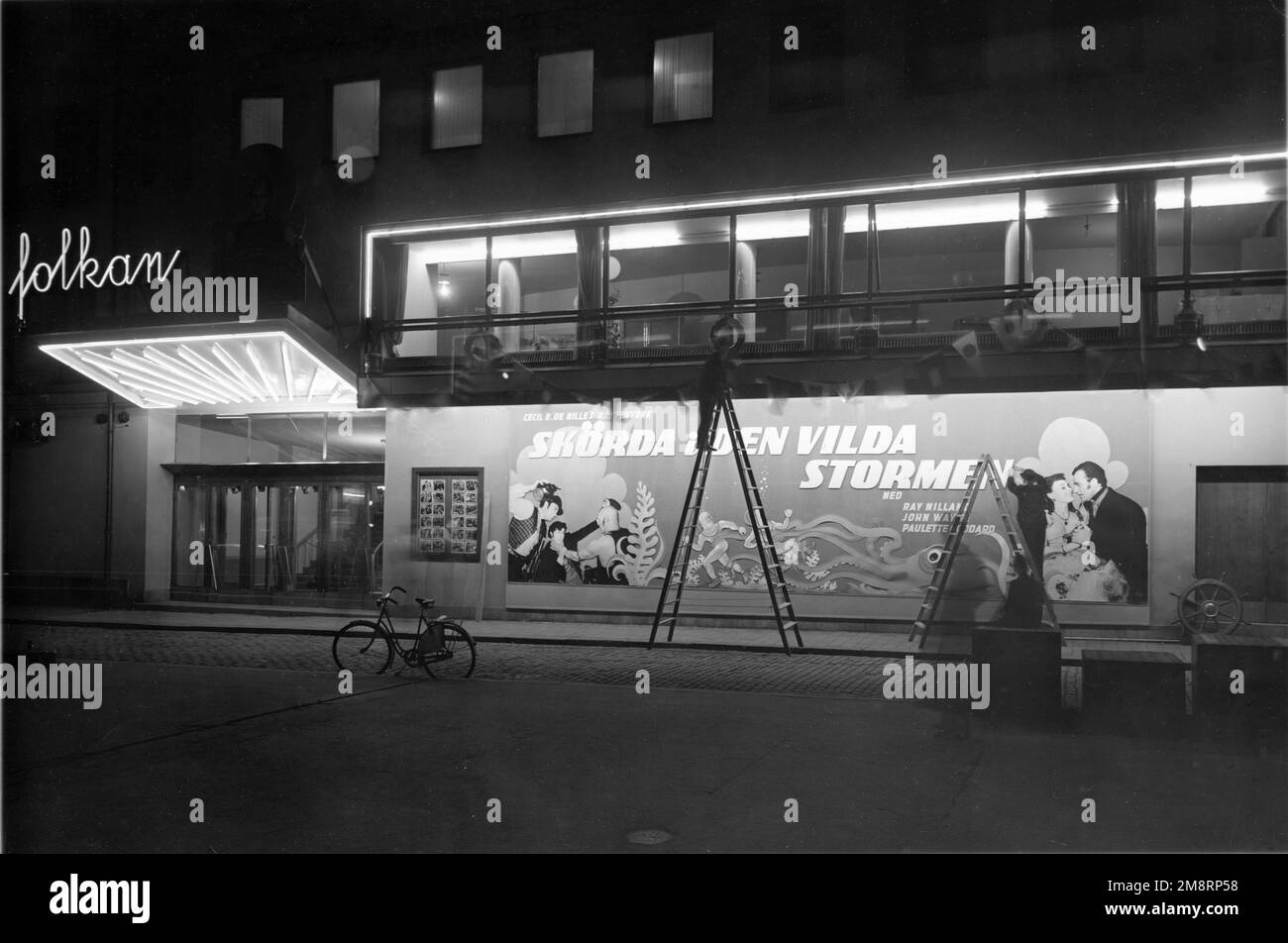 Folkan Biograf / Cinema in Sweden circa November 1942 with display being installed for RAY MILLAND JOHN WAYNE and PAULETTE GODDARD in REAP THE WILD WIND 1942 director CECIL B. DeMILLE Paramount Pictures Stock Photo