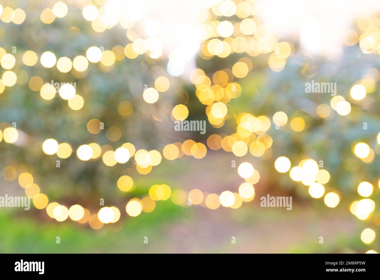 Defocus of Gold  lighting bokeh for background and inspiration Stock Photo