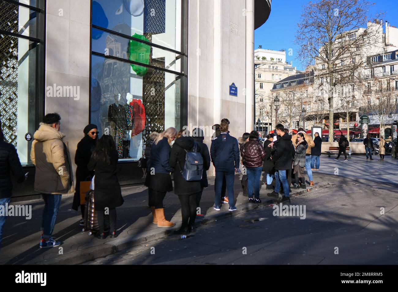 Paris, France. 15th Jan, 2023. People stop on a sunny day to take