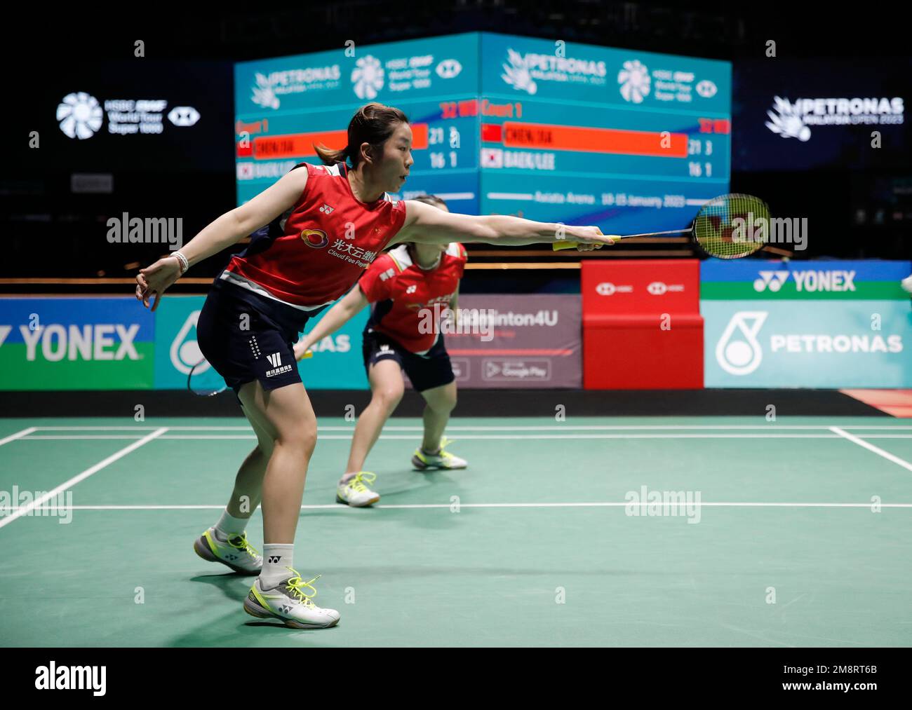 Kuala Lumpur, Malaysia. 15th Jan, 2023. Chen Qing Chen and Jia Yi Fan (L) of China play against Baek Ha Na and Lee Yu Lim of Korea during the Women Doubles Finals match of the Petronas Malaysia Open 2023 at Axiata Arena. Chen Qing Chen and Jia Yi Fan of China won with scores; 21/21 : 16/10 Credit: SOPA Images Limited/Alamy Live News Stock Photo